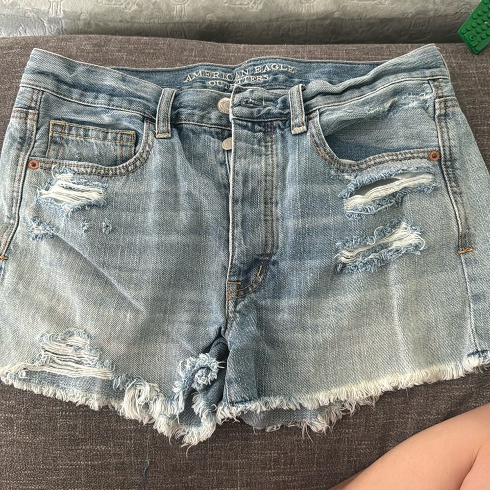 Ripped light denim shorts mid rise